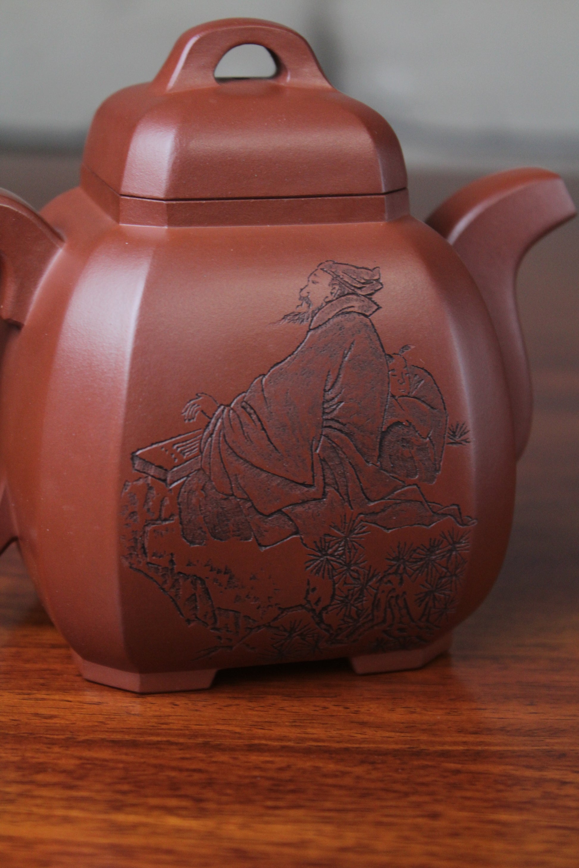 pattern of the collectible teapot from teapot artist on the table