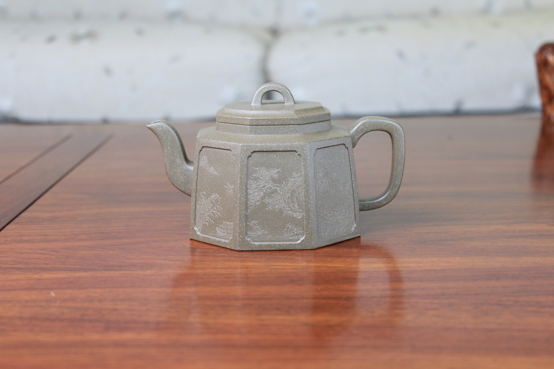 Front of the collectible teapot named ba fang