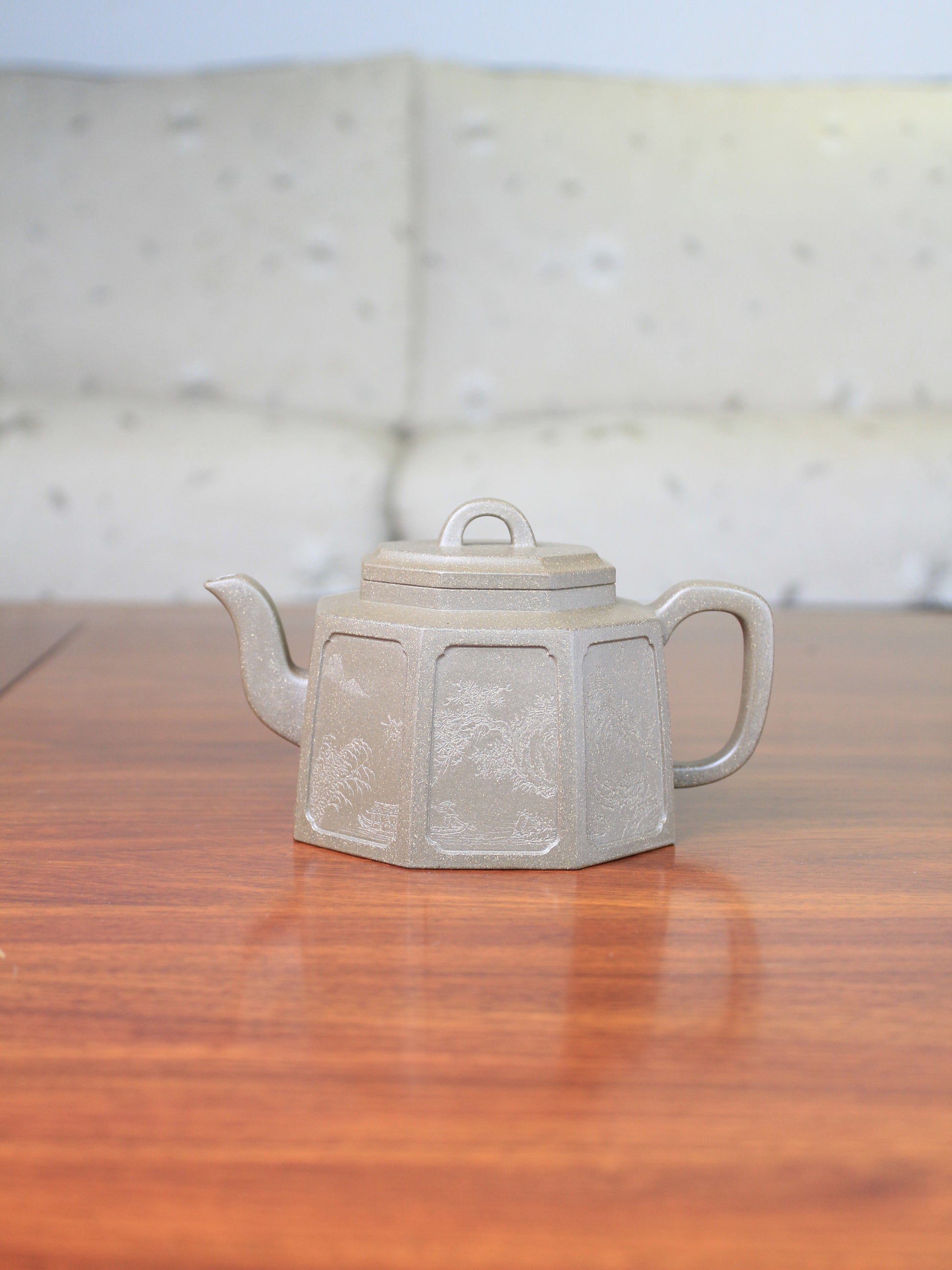 Collectible teapot named ba fang on the table