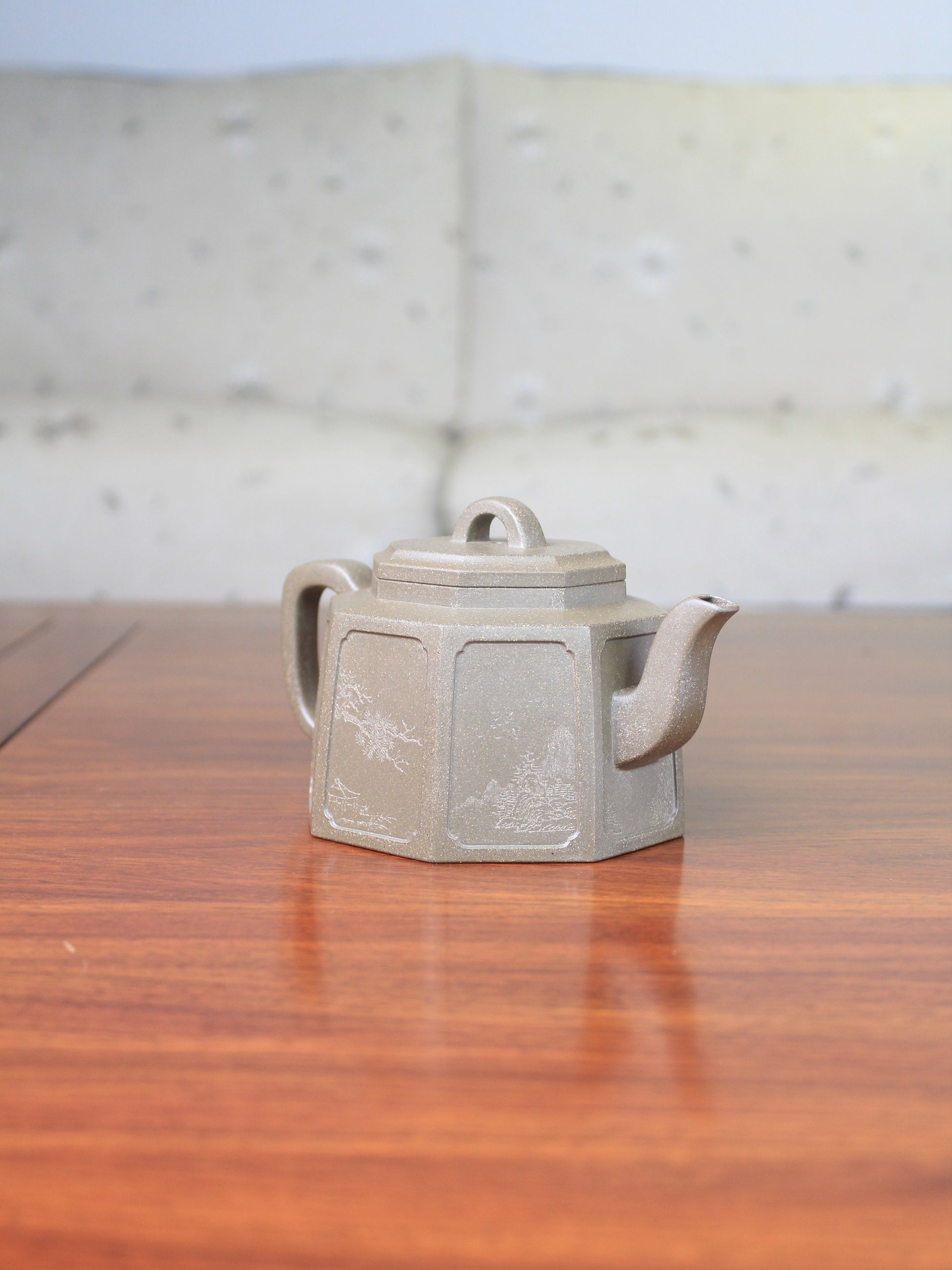 Left view of the collectible teapot named ba fang