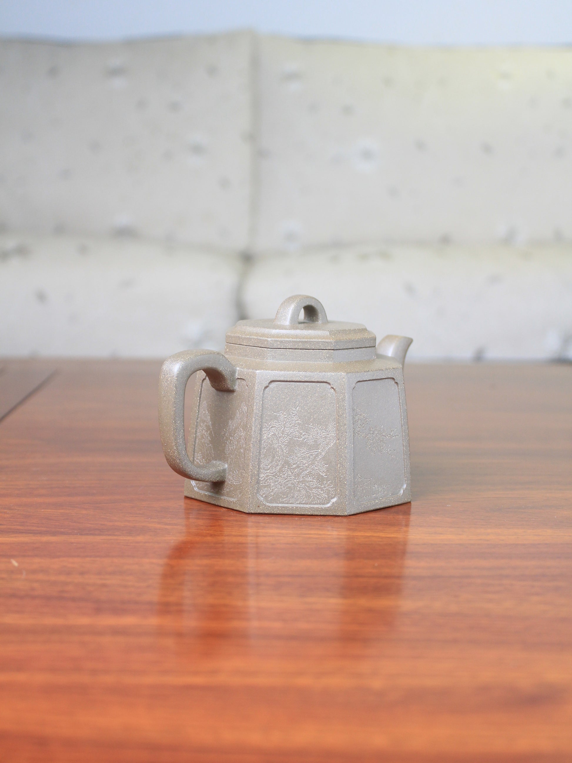 Side of the collectible teapot named ba fang