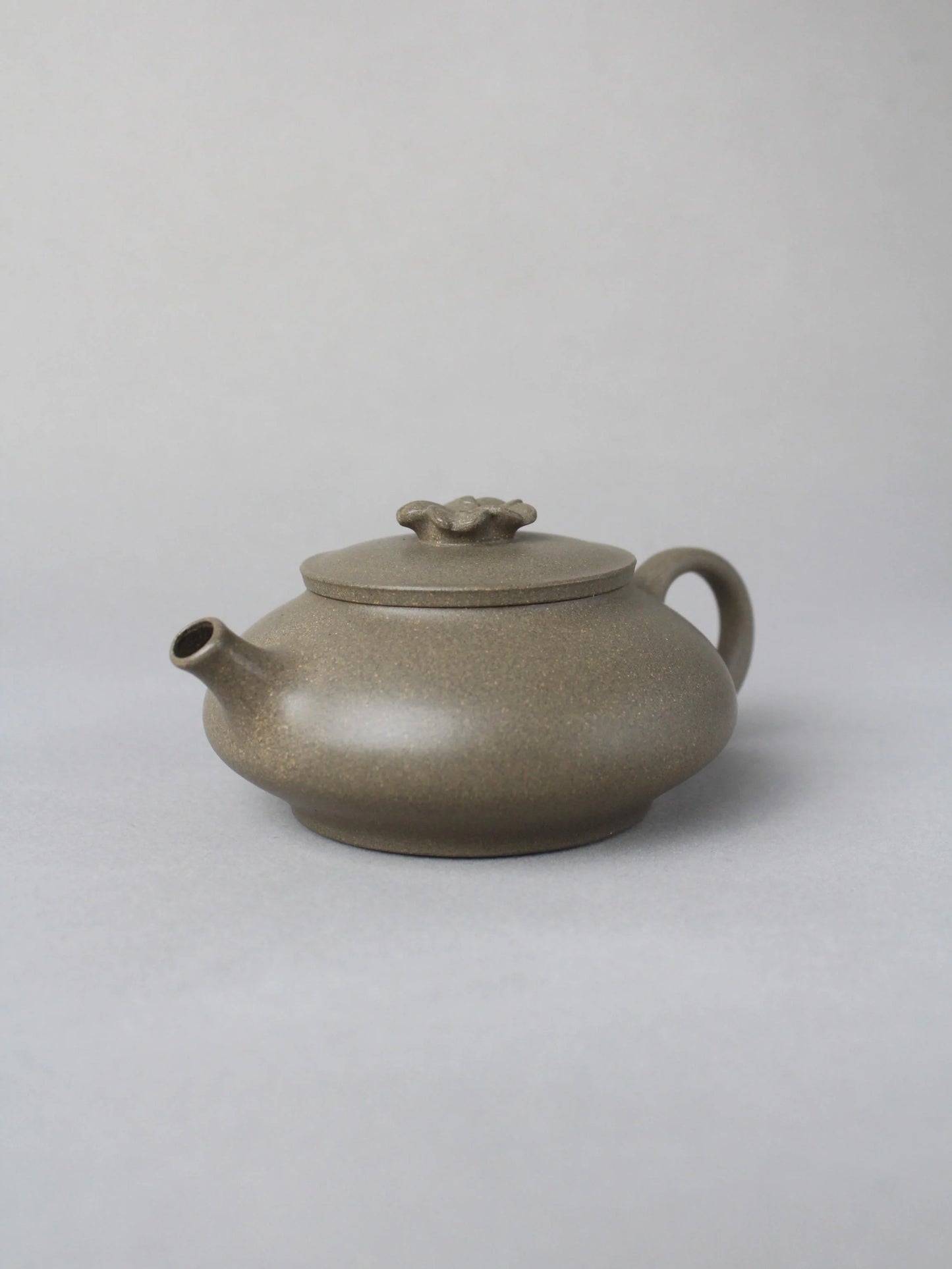 collectble teapot named flower on the table - right view