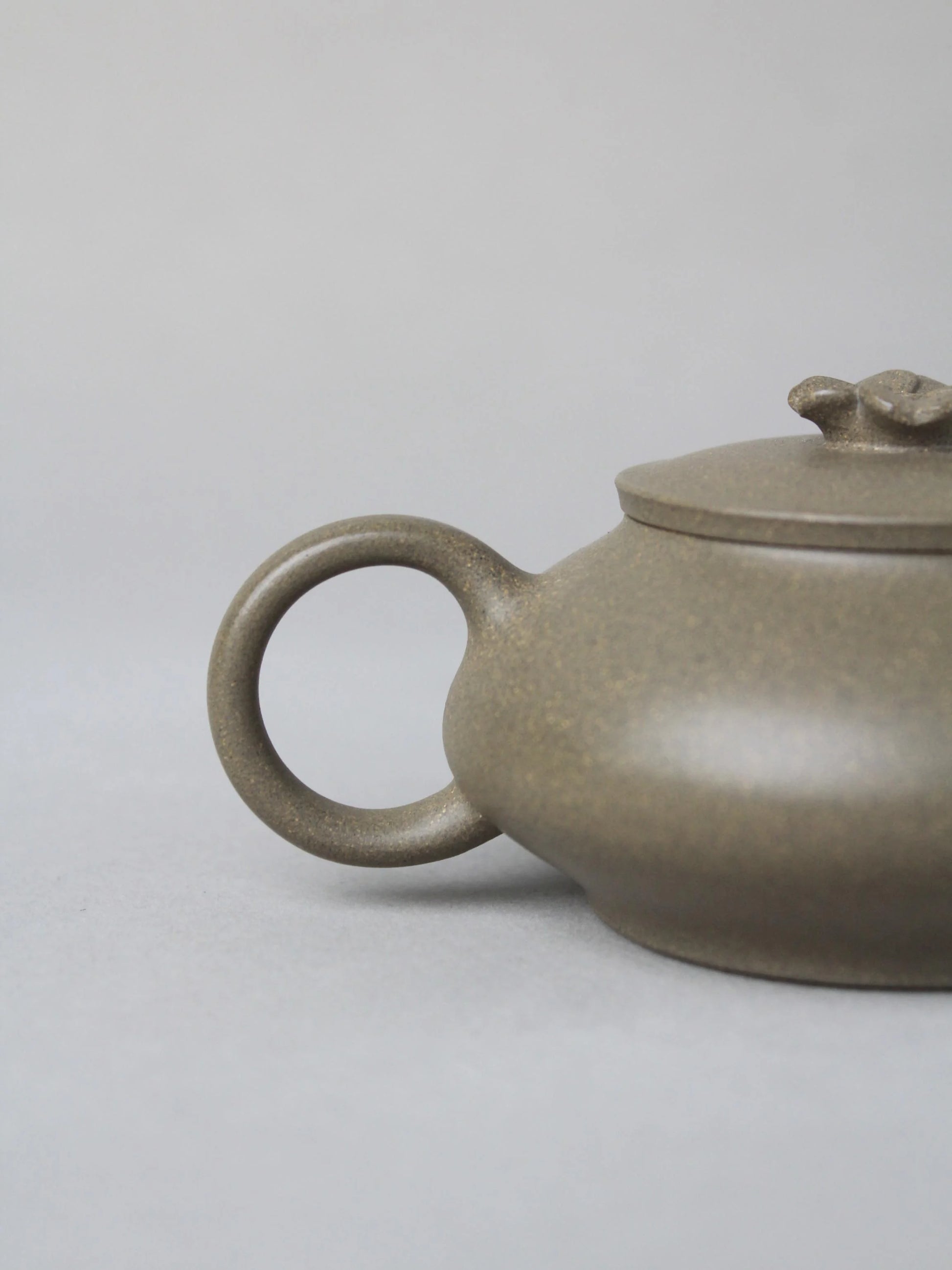 the handle of the collectible teapot named flower