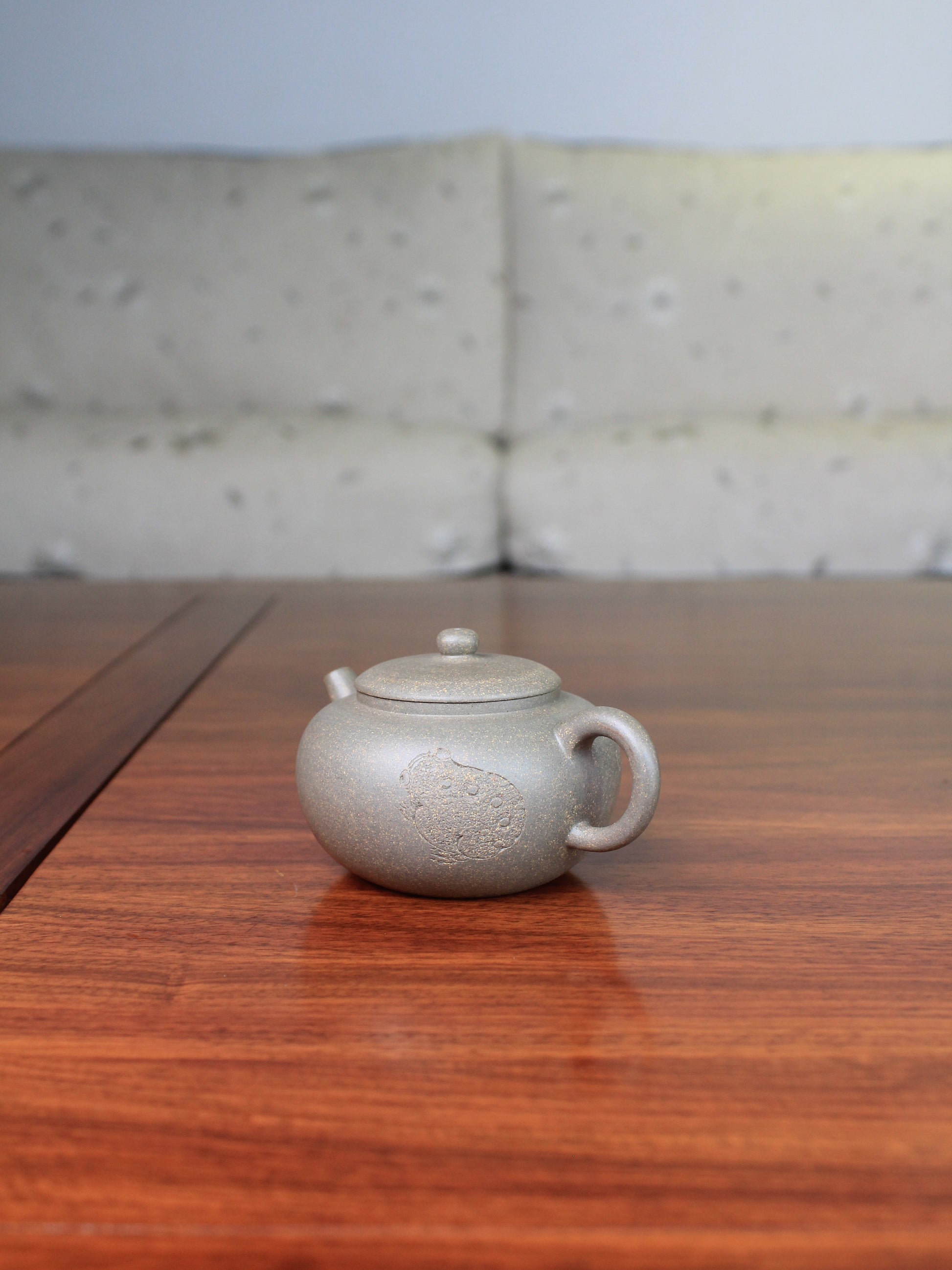Right of the Collectible teapot named toad, handmade by teapot artist