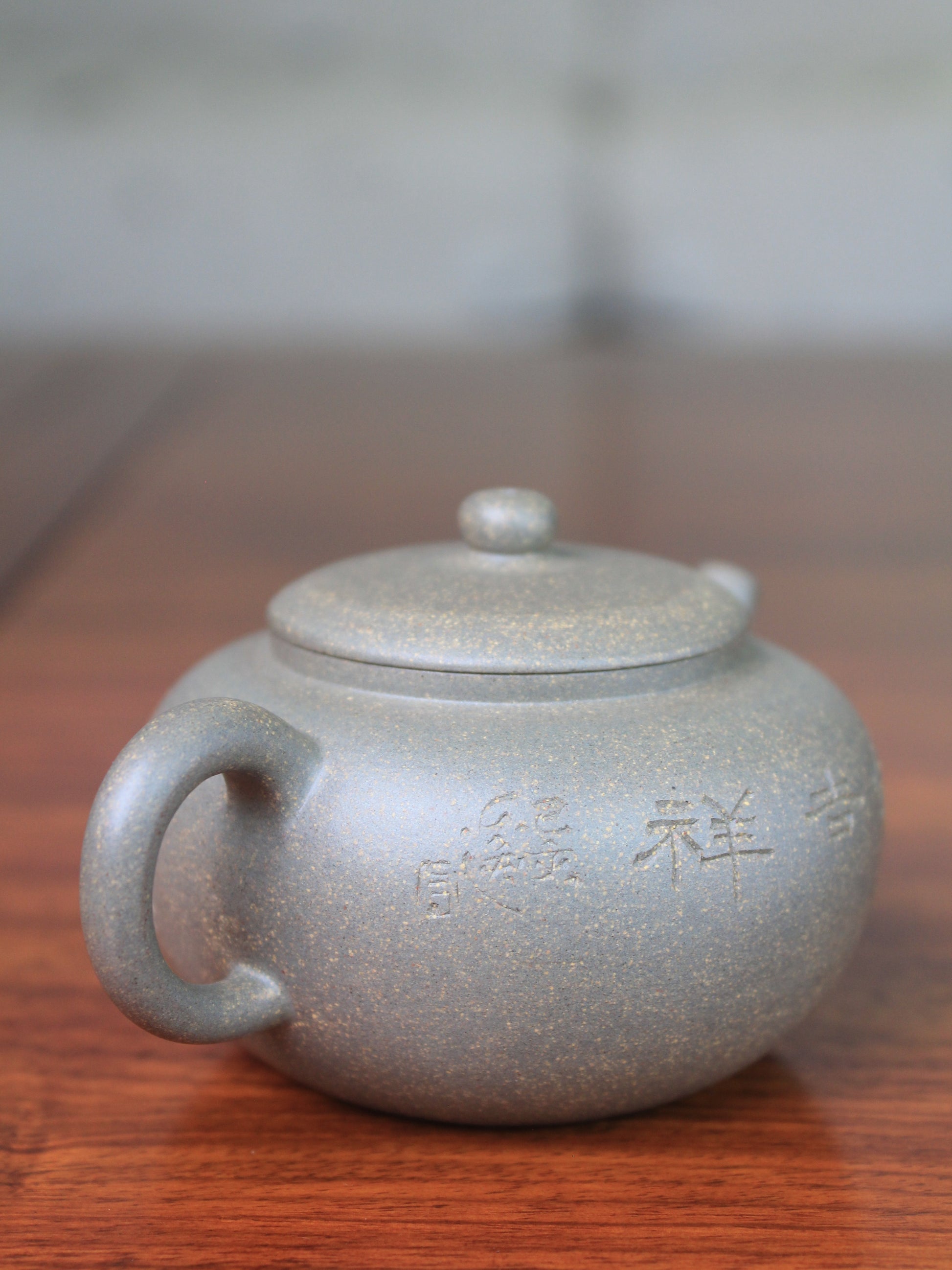 Detail of the Collectible teapot named toad, handmade by teapot artist