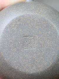 Bottom of the Collectible teapot named toad, handmade by teapot artist