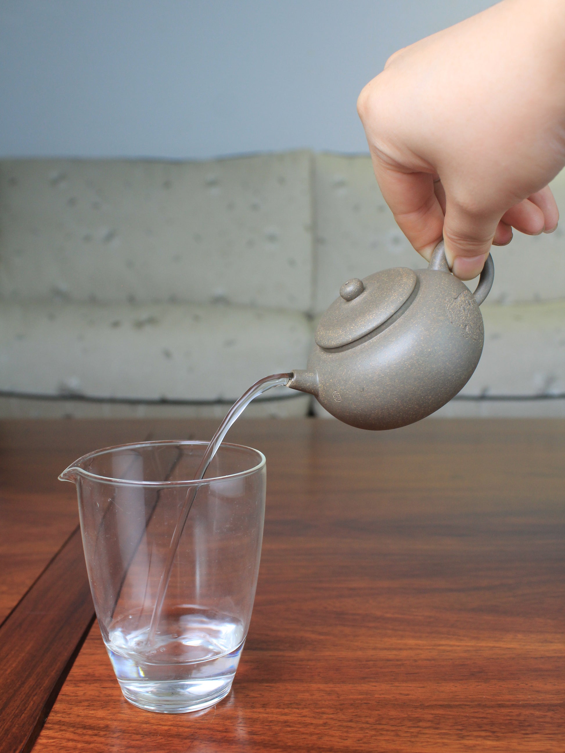 Good pour of the Collectible teapot named toad, handmade by teapot artist