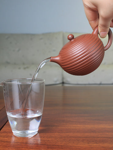 The Pour of the collectible teapot
