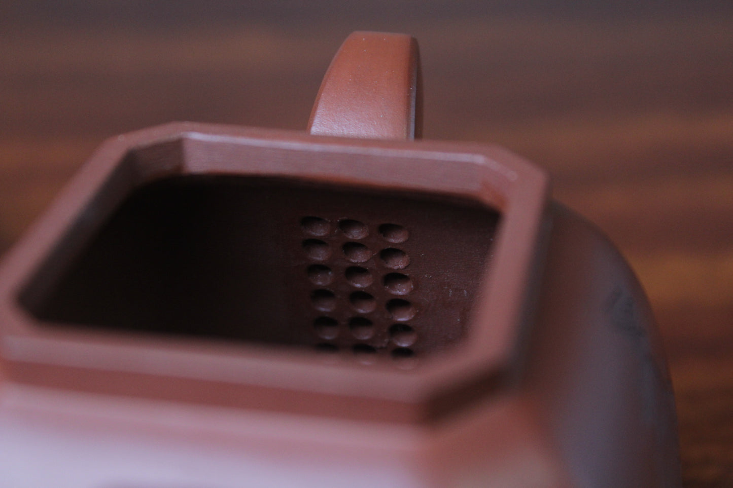 filter of the collectible teapot from teapot artist on the table