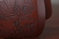 detail of the collectible teapot from teapot artist on the table