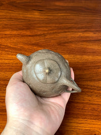 hold the collectible teapot named gong chun in the hand