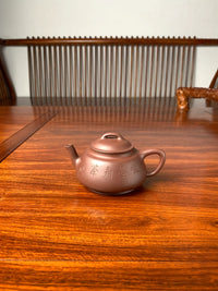 collectible teapot named wu piao fully handmade by teapot master qian xiaojun