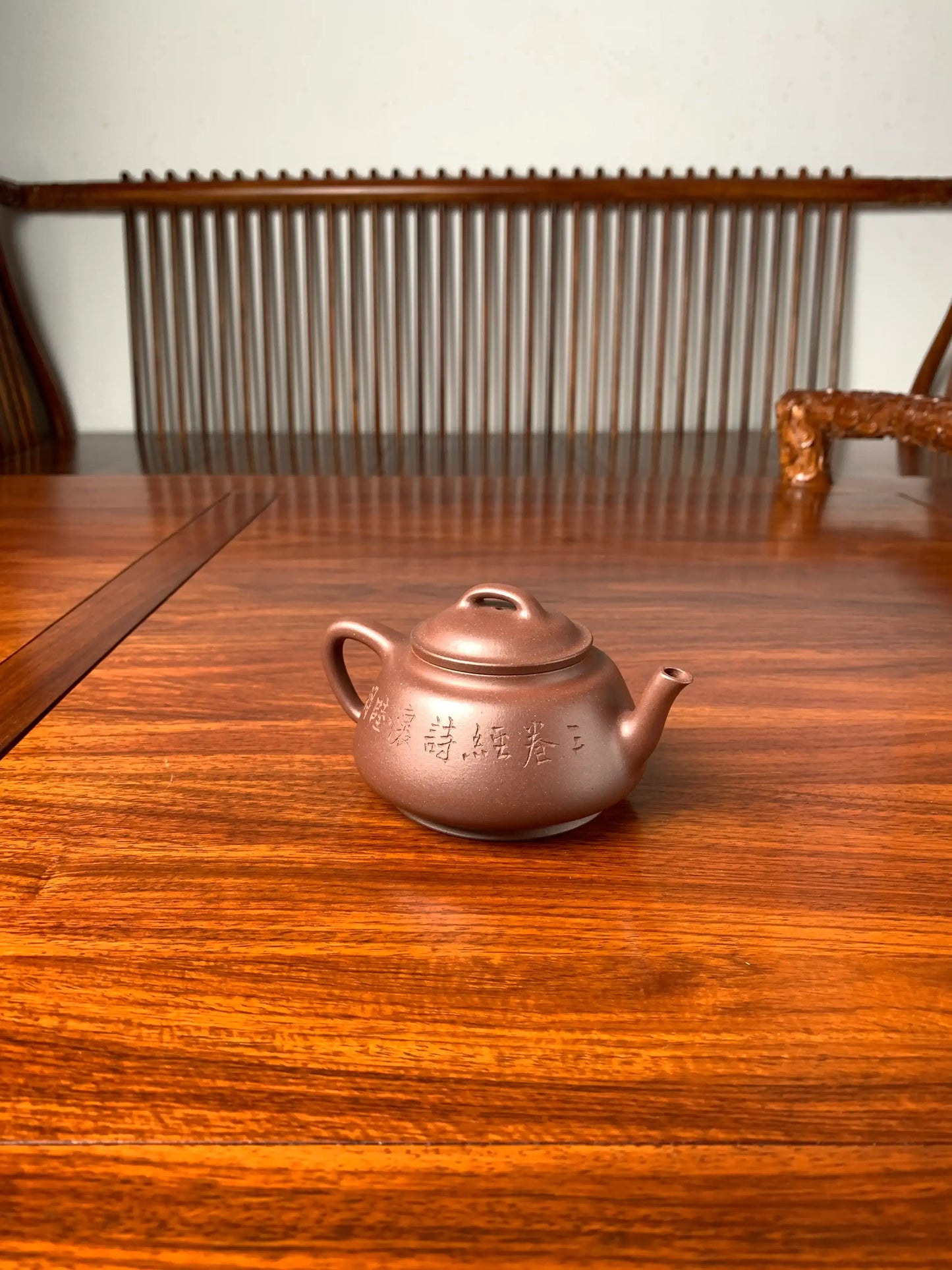 collectible teapot named wu piao fully handmade by teapot master qian xiaojun left view