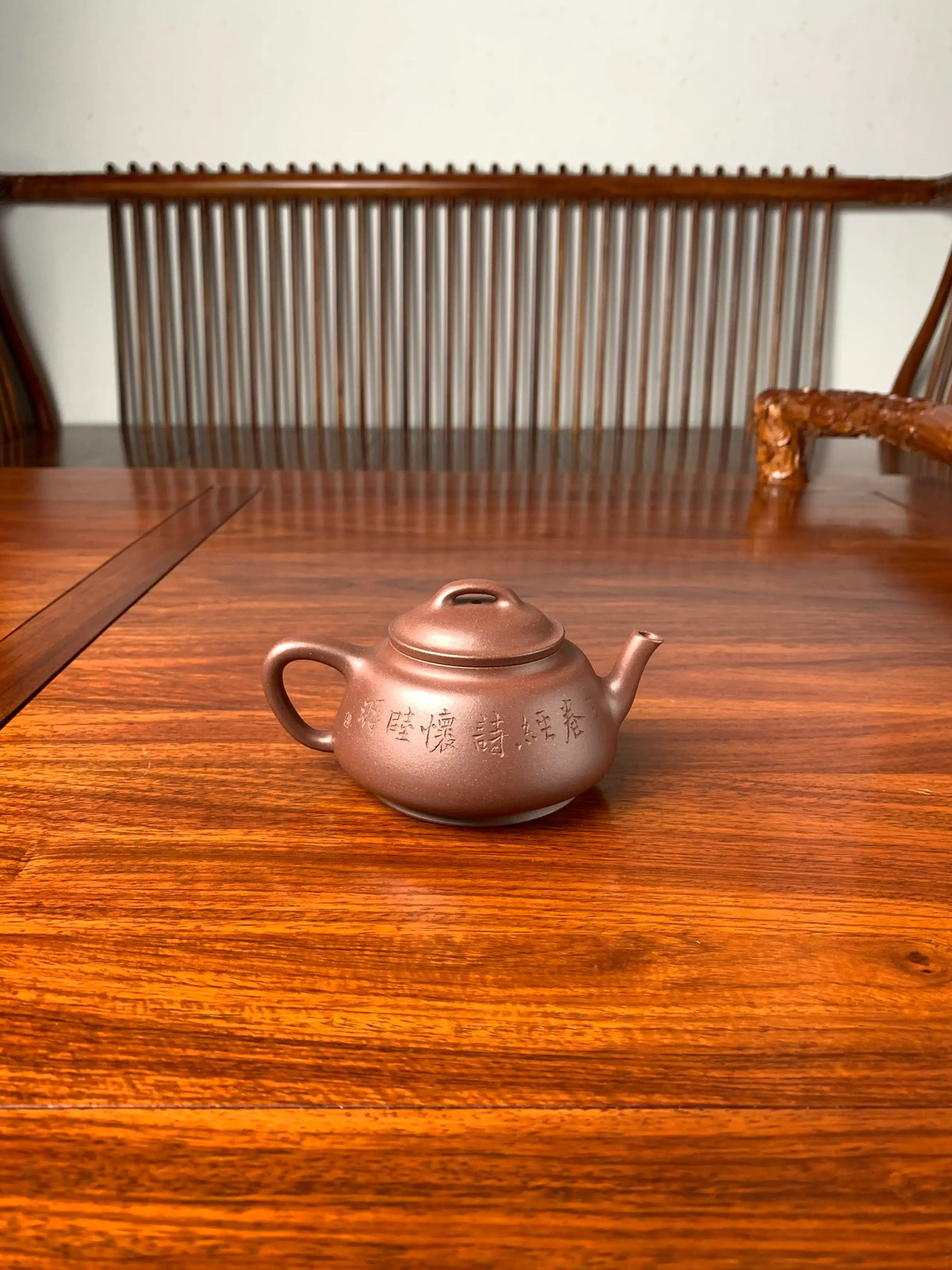 collectible teapot named wu piao fully handmade by teapot master qian xiaojun back view