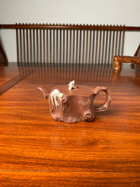 collectible teapot named ao xue on the table