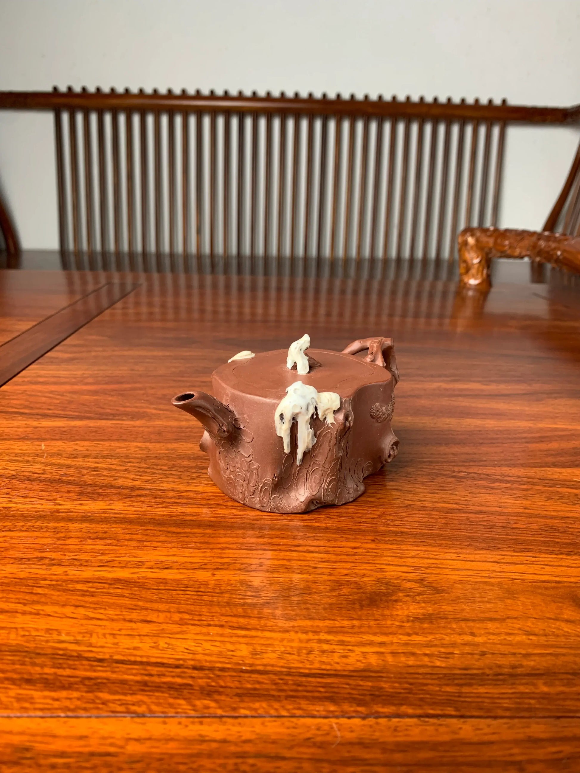 collectible teapot named ao xue on the table righ view