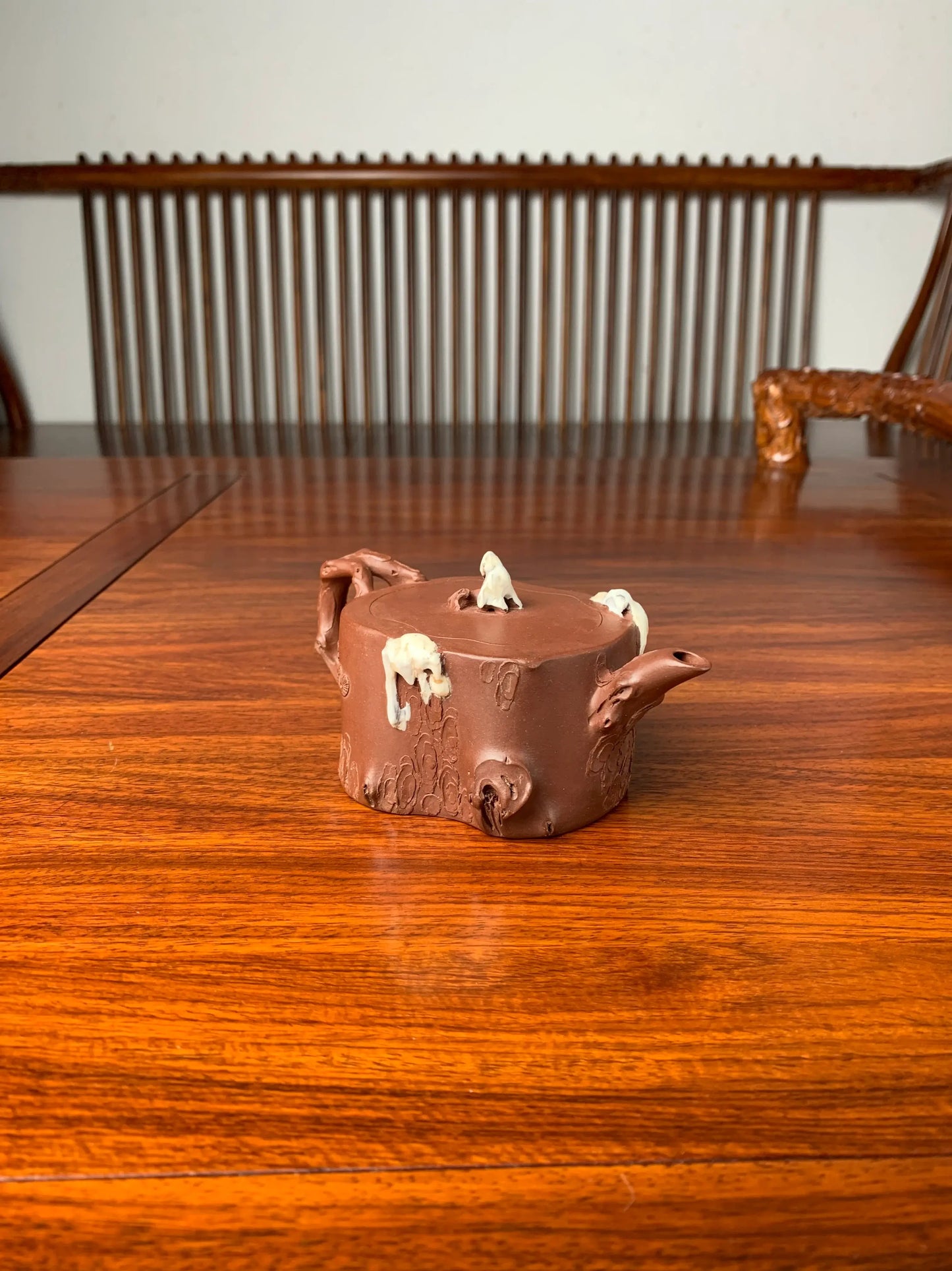 collectible teapot named ao xue on the table left view