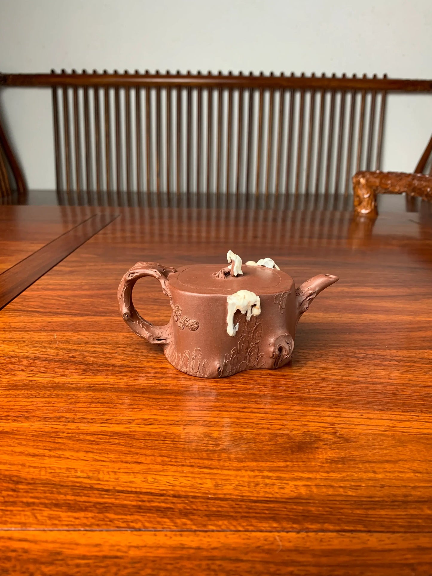 collectible teapot named ao xue on the table back view