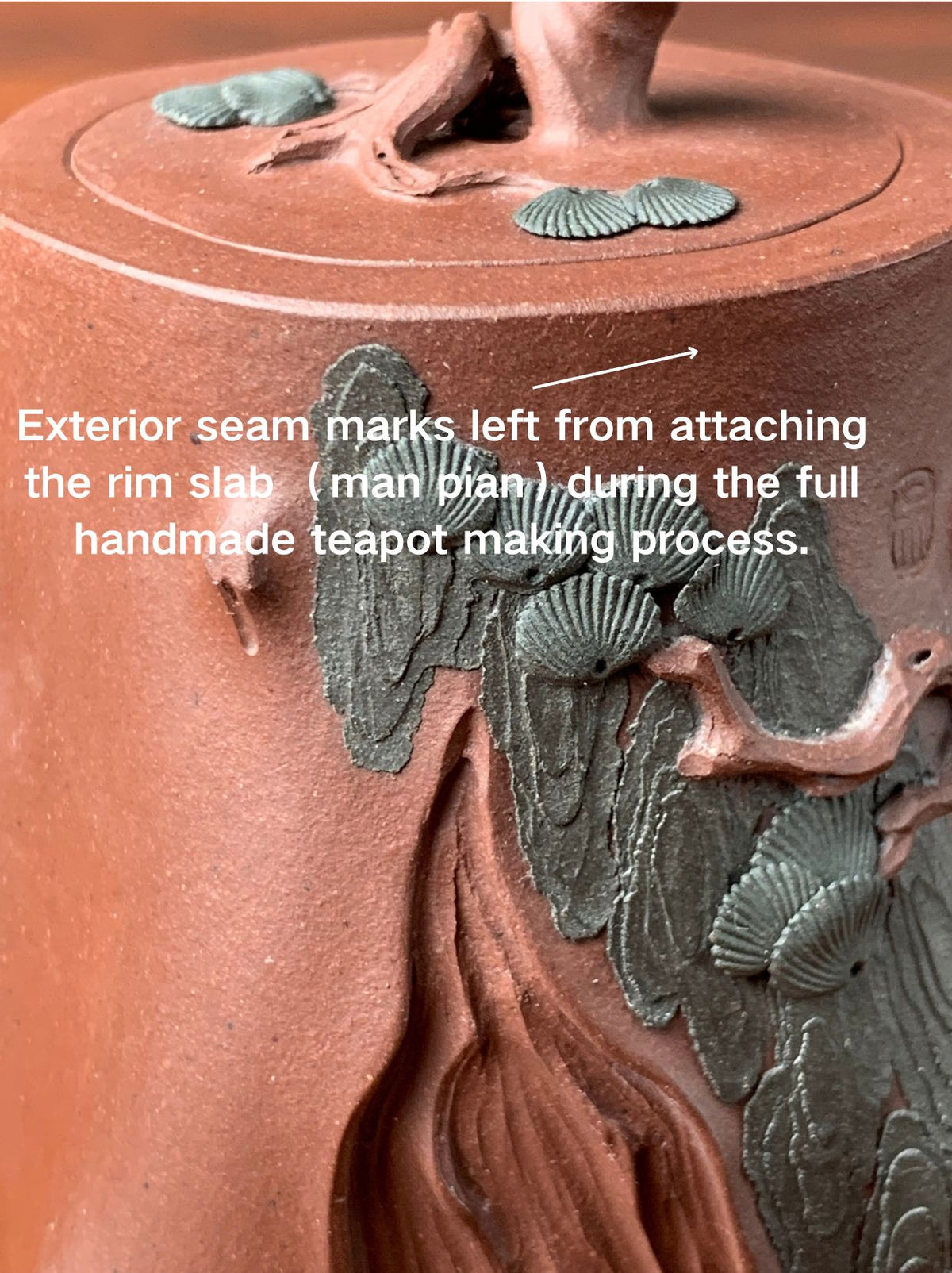 A close-up view of the “manpian” (full-sheet) marks left when a teapot was fully handmade