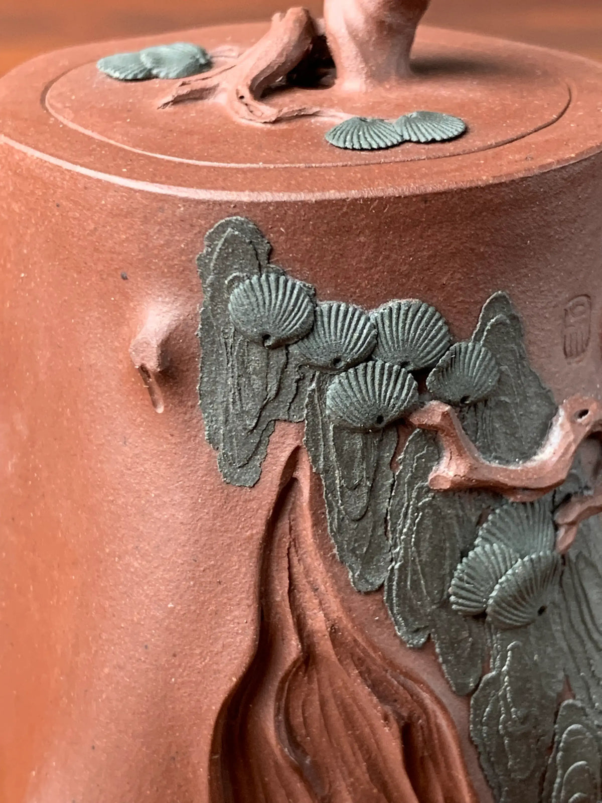 Details of the pine needle pattern on the teapot
