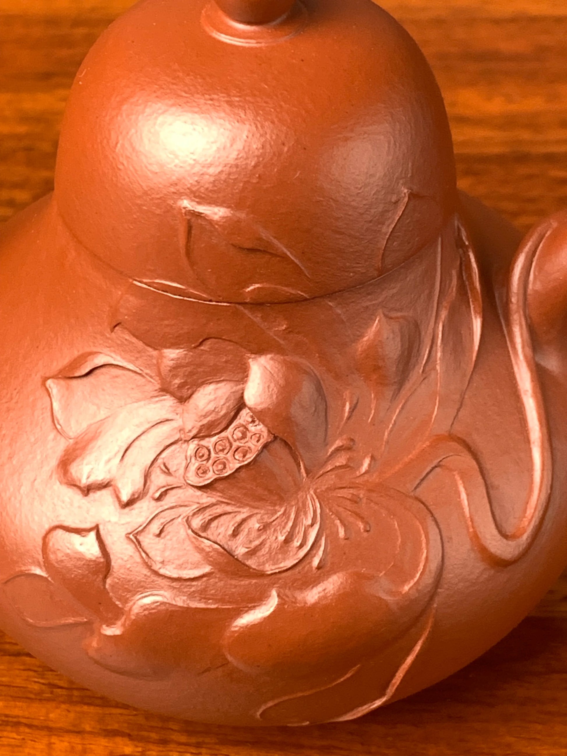 Close-up view of the hand-sculpted lotus details