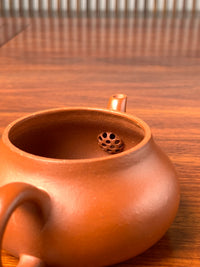 the ball filter of the jun de yixing teapot