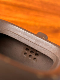 the nine hole filter of the zisha teapot