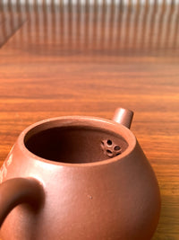 the ball filter of the zisha teapot wen dan