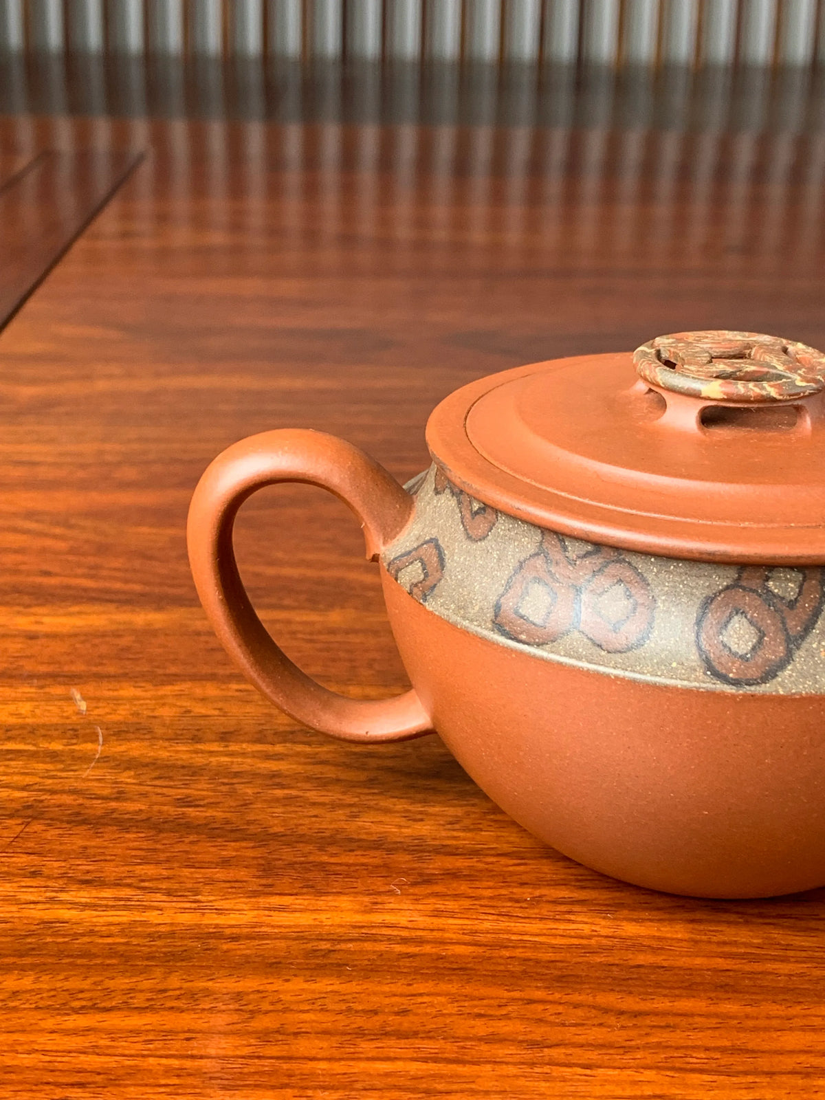 the handle of the yixing zisha clay teapot 