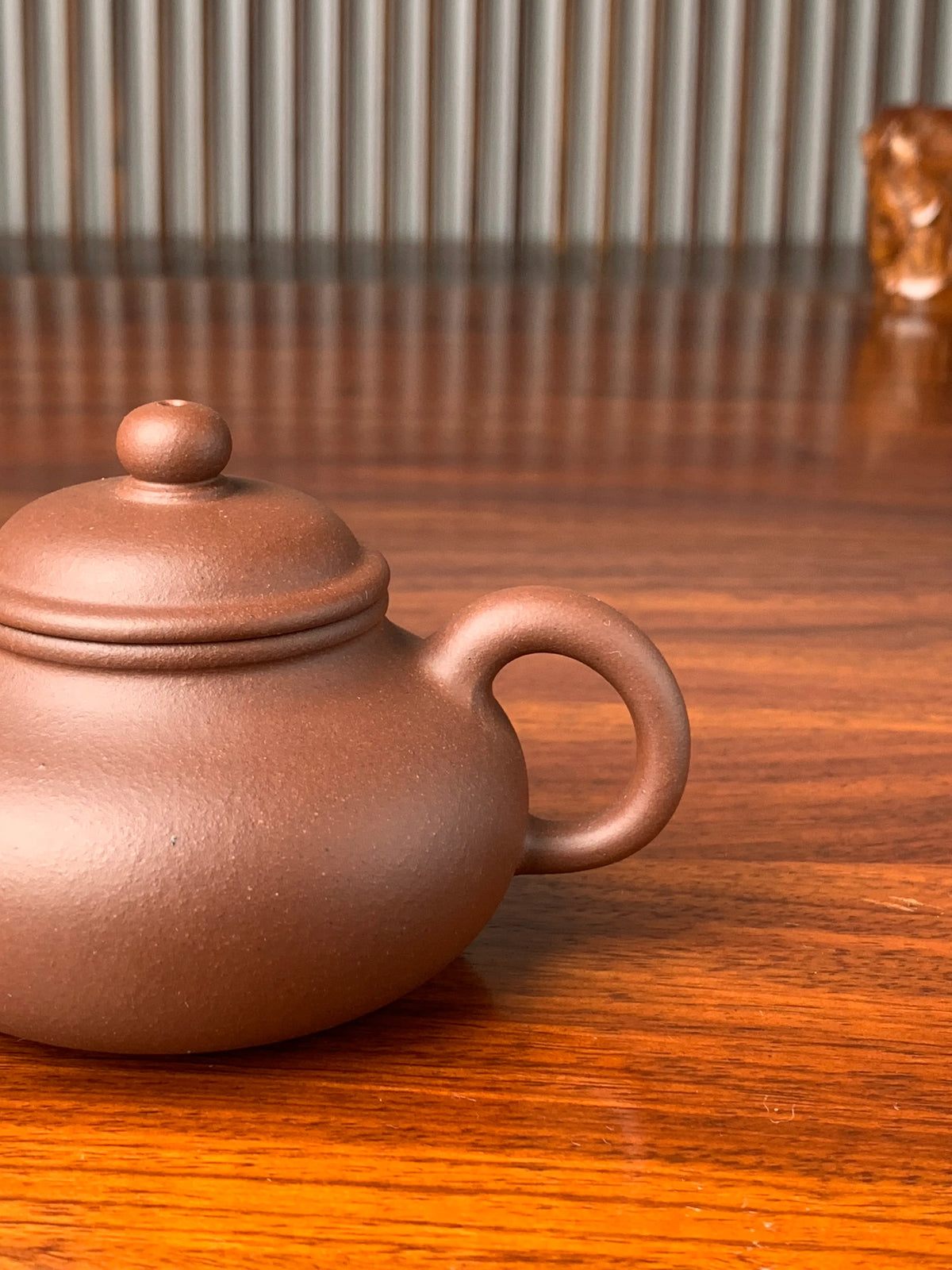 the handle of the yixing zisha clay teapot rong tian