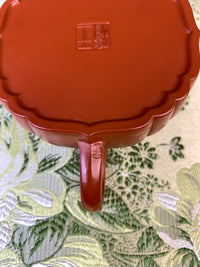 the teapot mark of potter on the handle