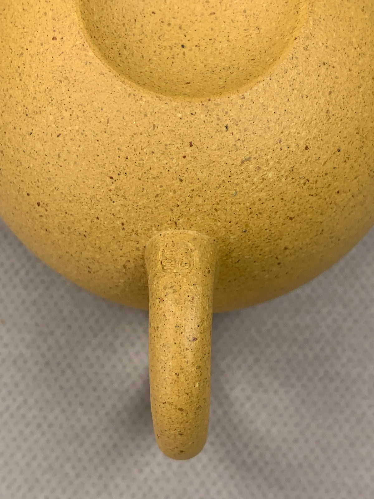 teapot mark of potter sun on the handle