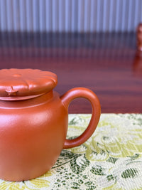 the handle of the handmade yixing teapot jun hat