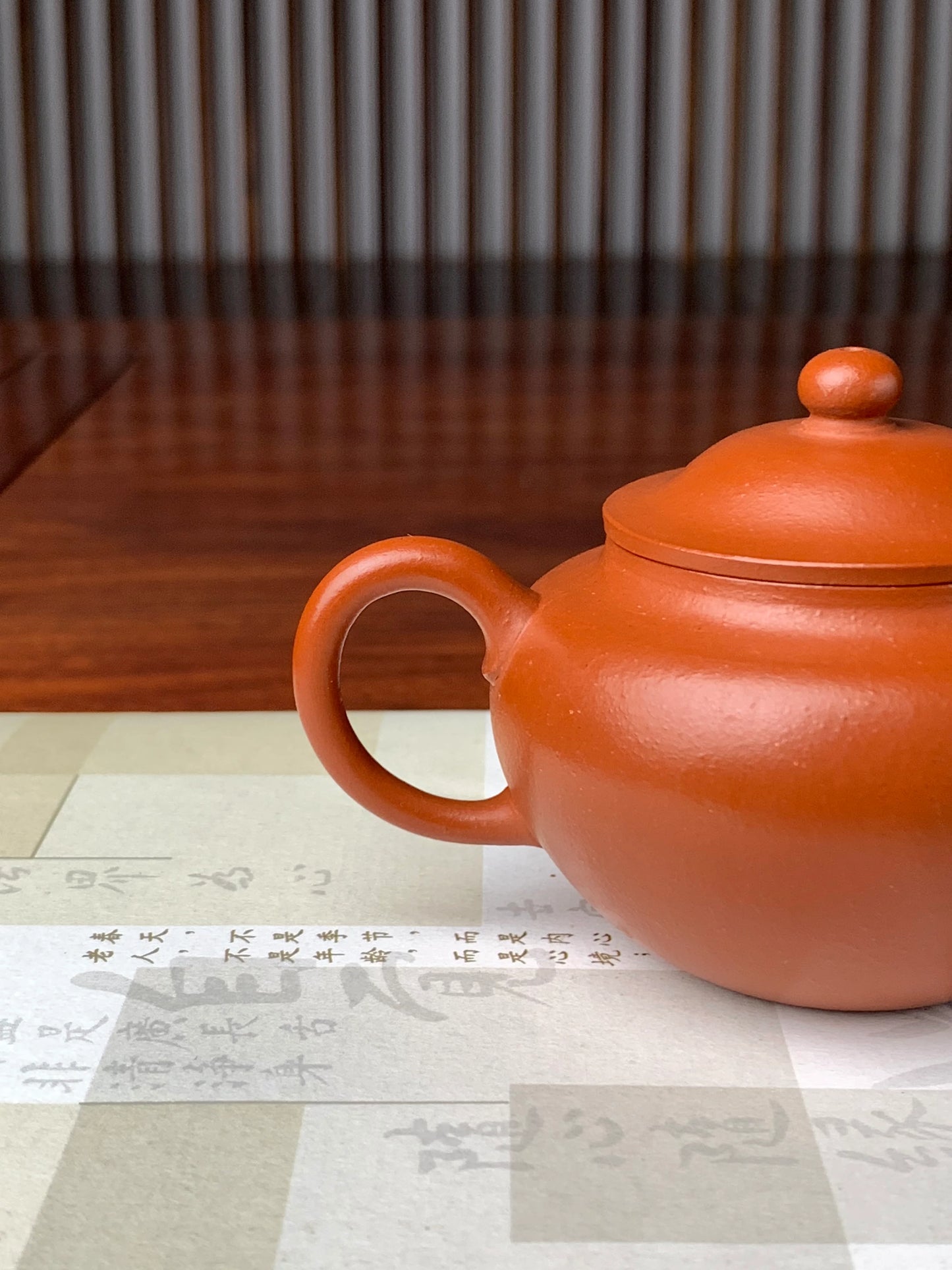 View the teapot’s handle from another angle.