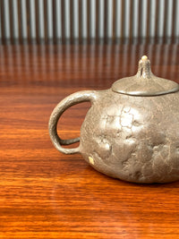 the handle of the collectible teapot named gong chun