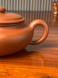 the handle of the yixing zisha clay teapot bian fu