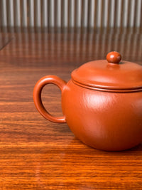 the handle of the collectible teapot