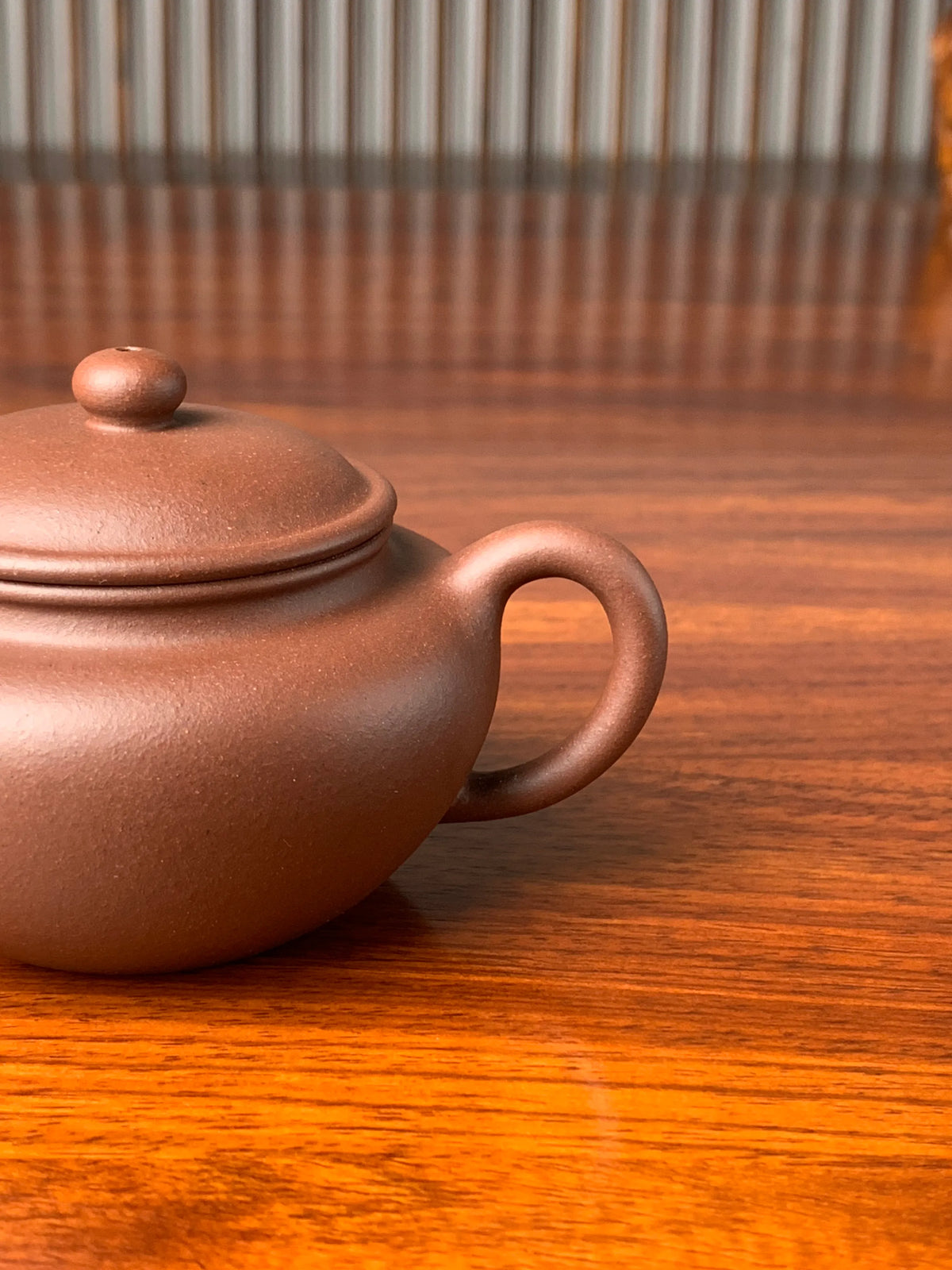 the handle of the yixing zisha clay teapot