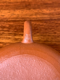 Close up photo of teapot handle seal