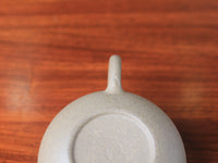handle of the yixing zisha teapot named yuan