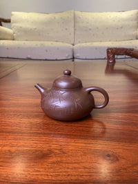 this is a handmade pottery teapot artwork