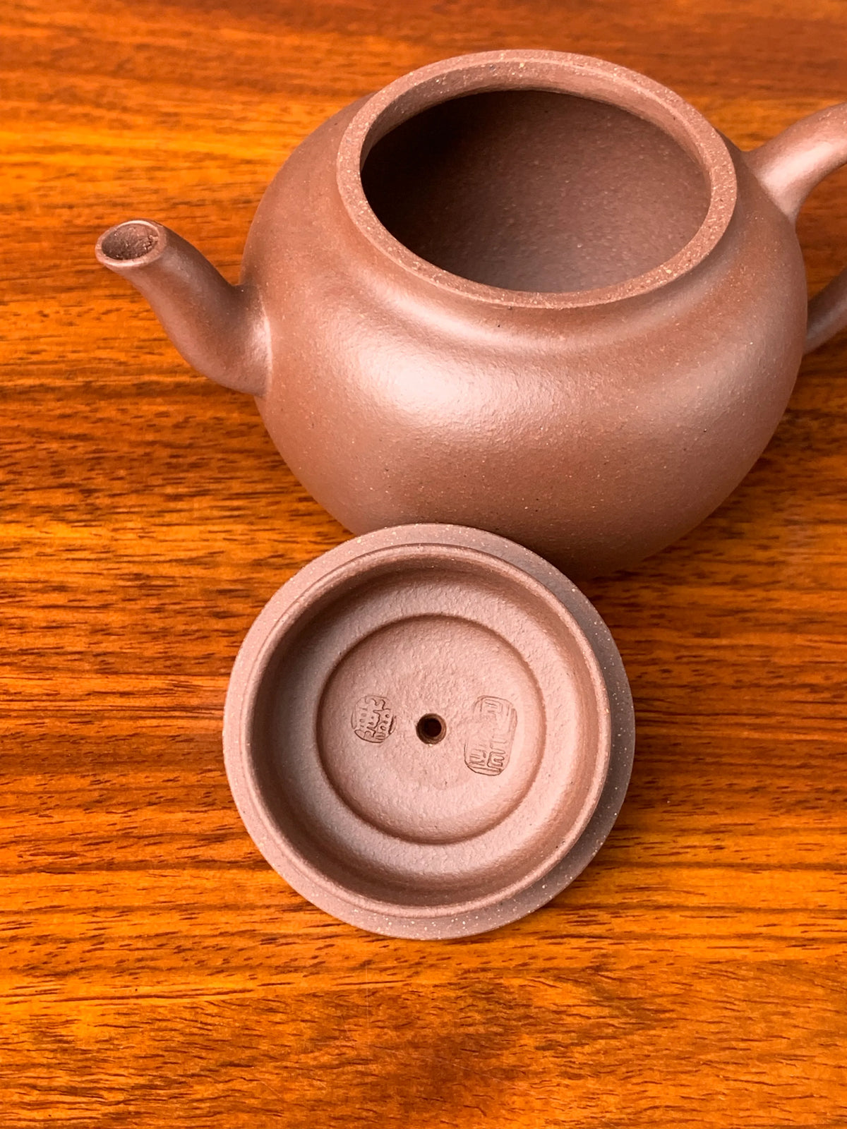 there are two teapot marks in the lid of handmade yixing teapot 