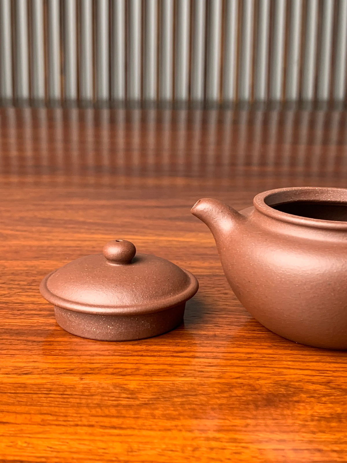 the lid and the spout of the handmade yixing zisha clay teapot 