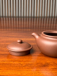 the lid and the spout of the handmade yixing zisha clay teapot 