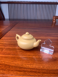 handmade yixing teapot named xiao ying left view
