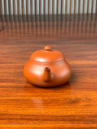 the side view of the handmade yixing teapot jun de