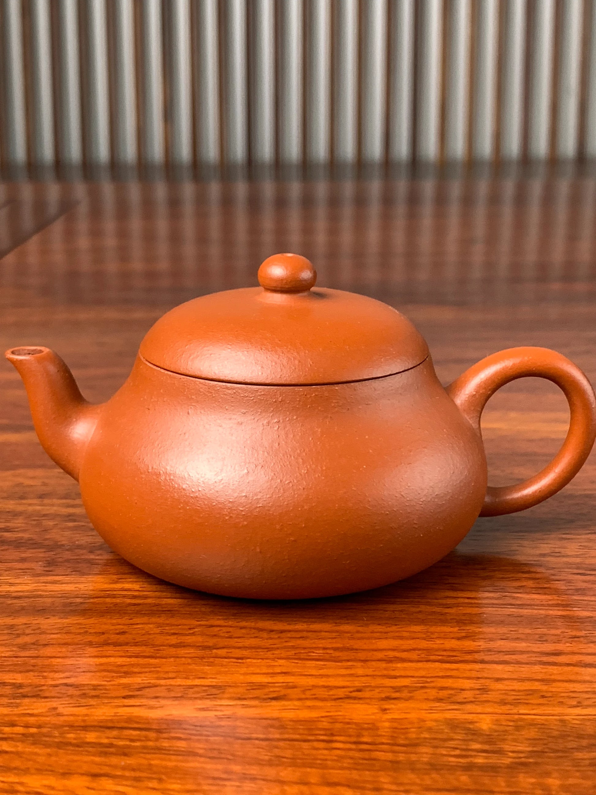 A close up photo of the body of this teapot