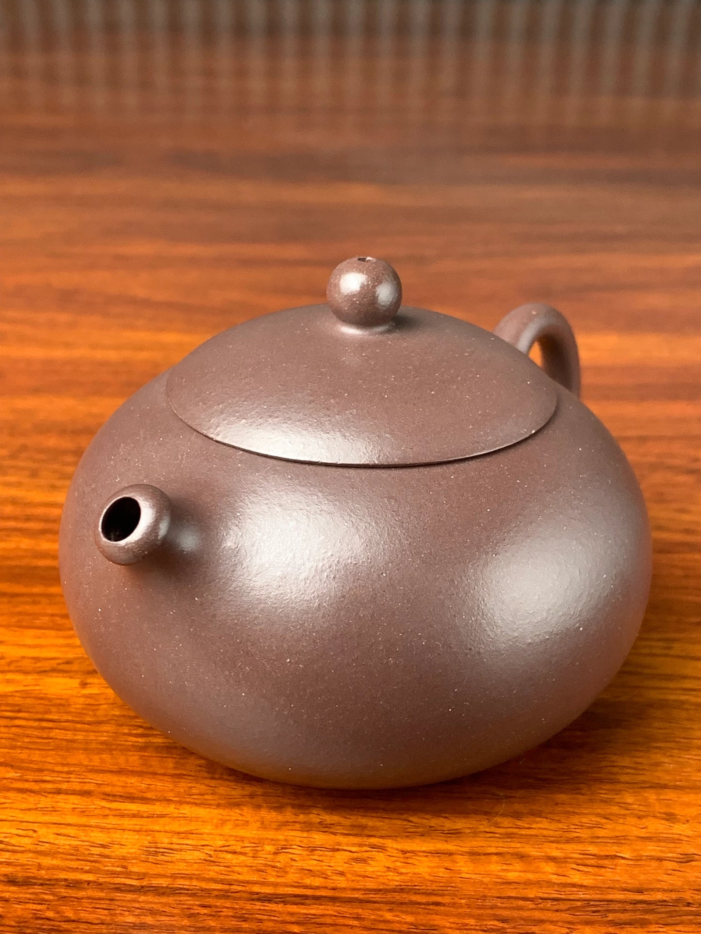 A close up photo of this xi shi teapot