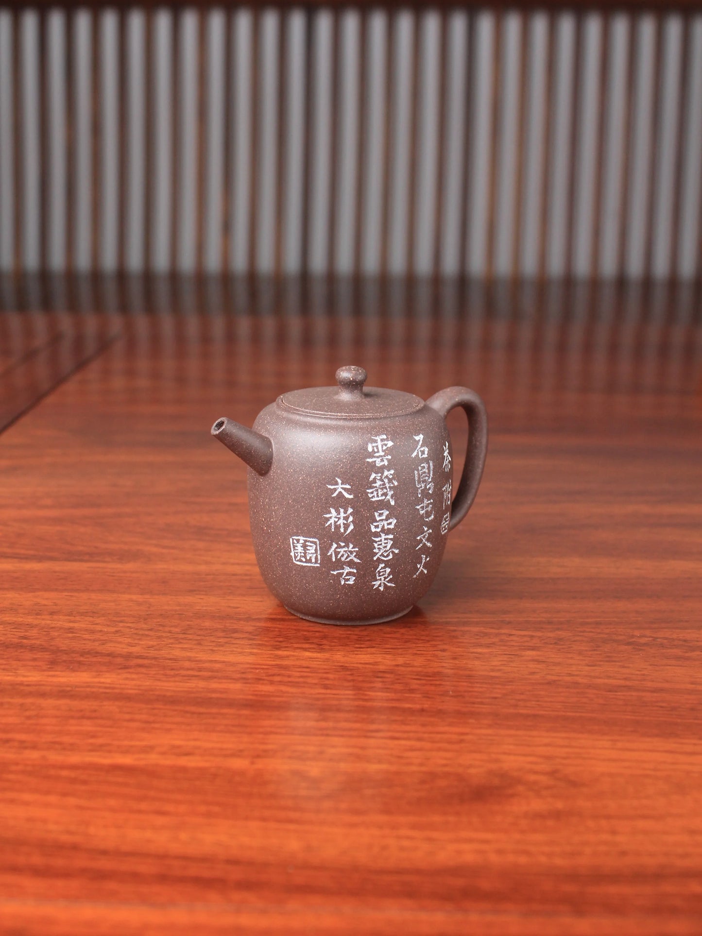 handmade yixing teapot named da bin lian zi on the table right view