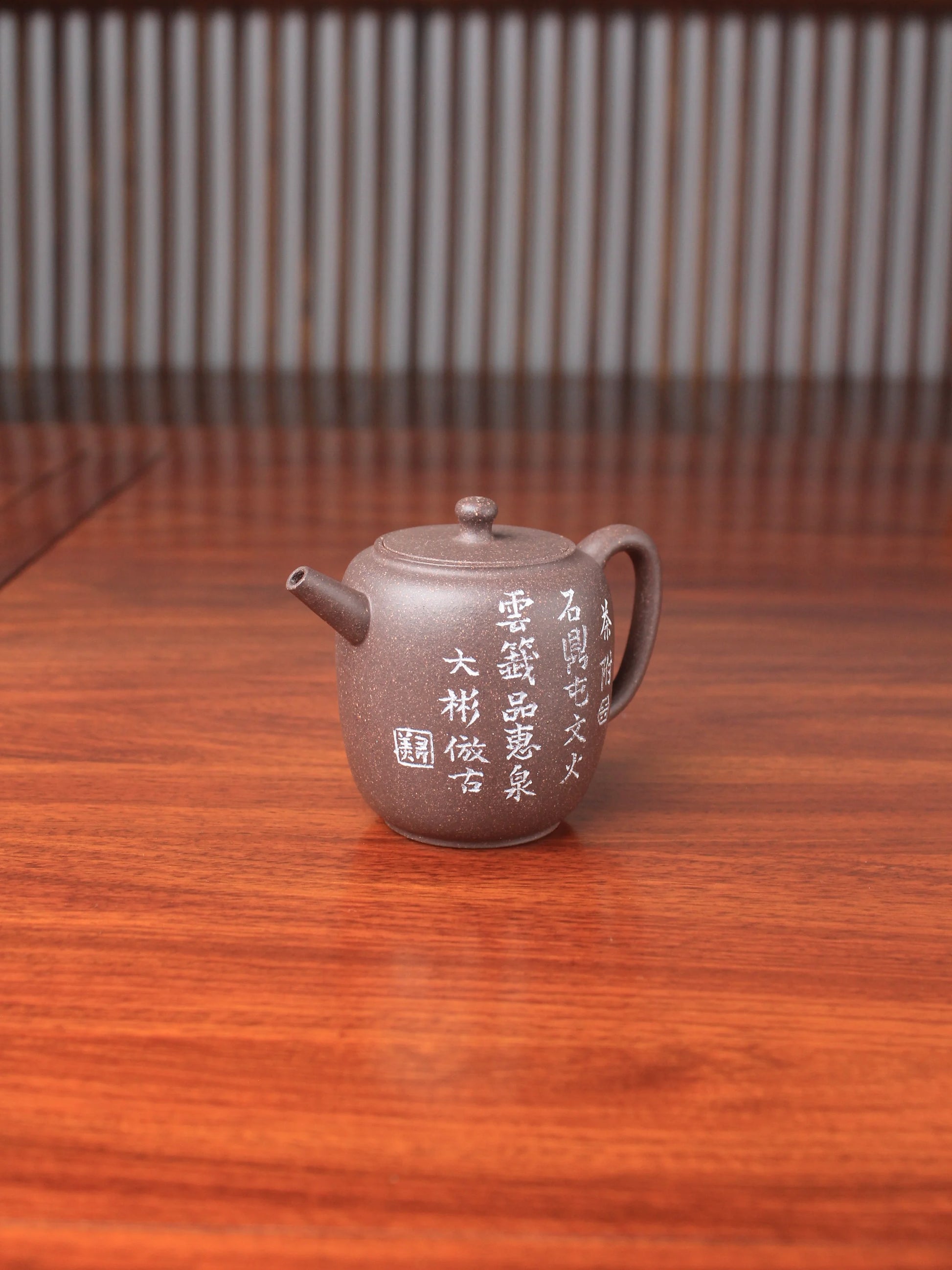 handmade yixing teapot named da bin lian zi on the table right view